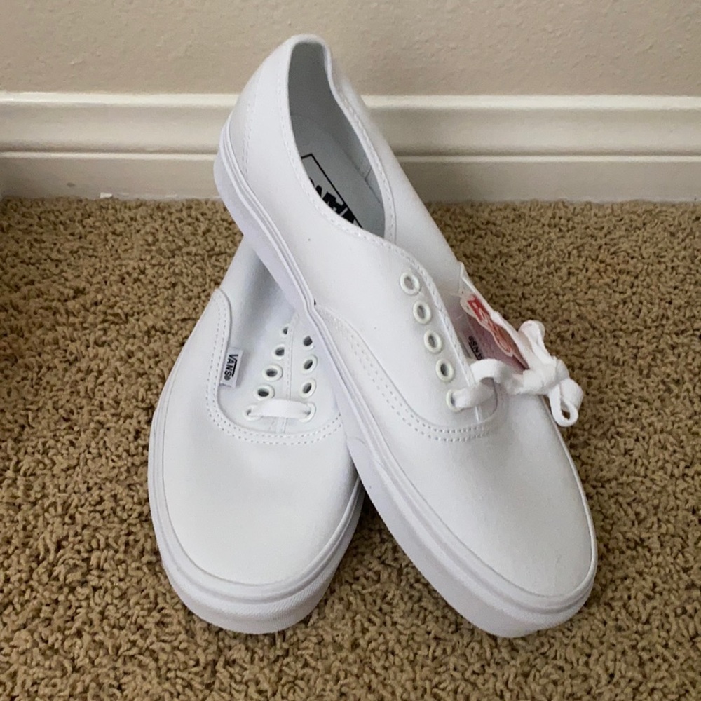 White lace-up Vans